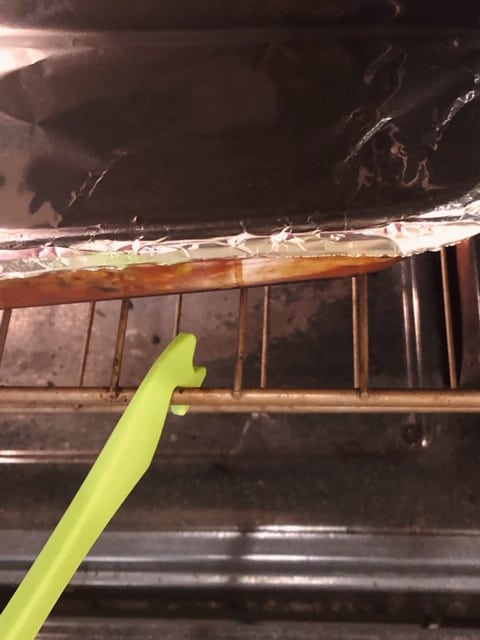 oven pull checking on vegan lasagna