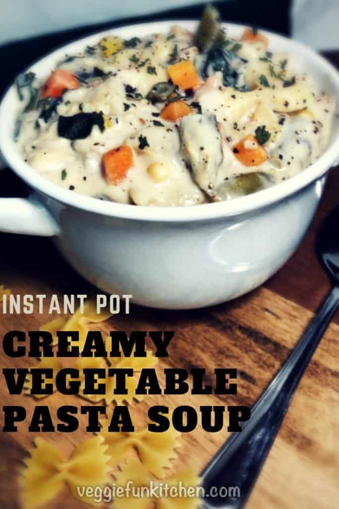 creamy vegetable bow time pasta soup in white bowl