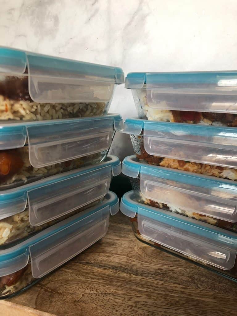 Hawaiian bbq soy curls over rice in 8 meal prep containers