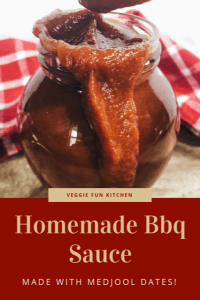 bbq sauce in glass jar with red checkered cloth