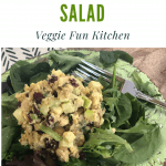 curried chickpea salad on bed of lettuce