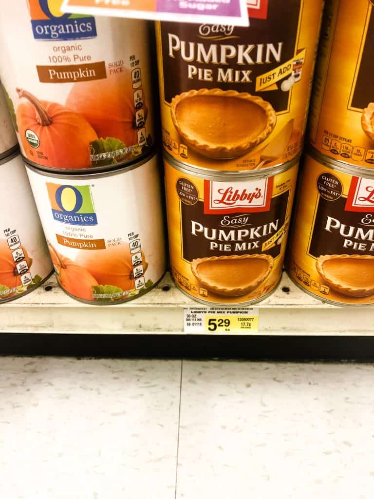 cans of pumpkin pie mix on a shelf