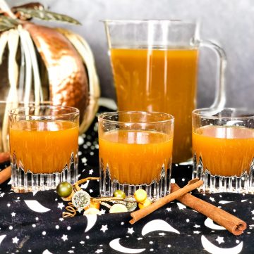 pumpkin drink in picture with three filled glasses