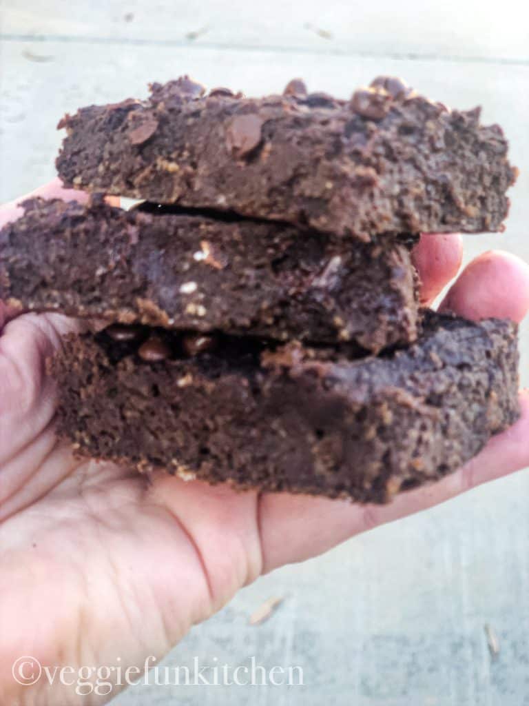 three brownies in hand