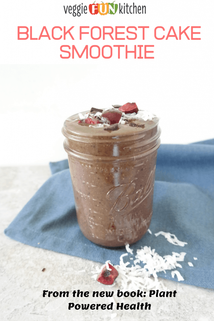 black forest cake smoothie in jar with blue napkin with text overlay
