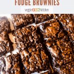 fudge brownies cut on parchment paper with text overlay