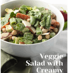 veggie salad in white bowl with green napkin with pinterest text overlay