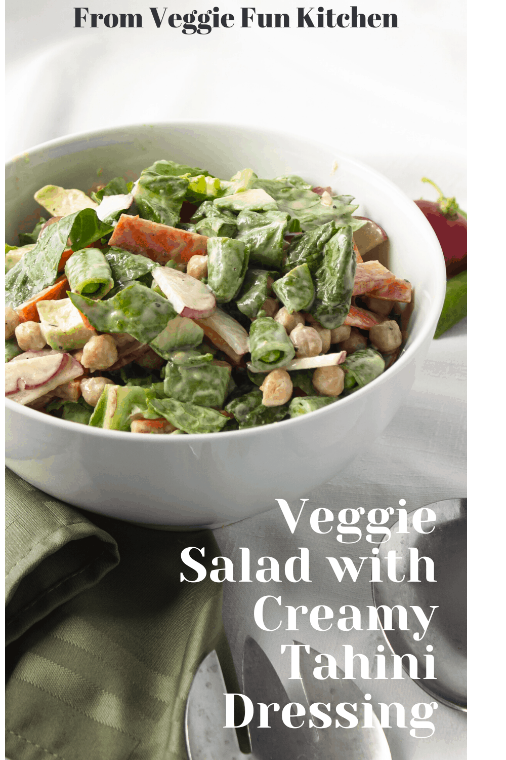 veggie salad in white bowl with green napkin with pinterest text overlay