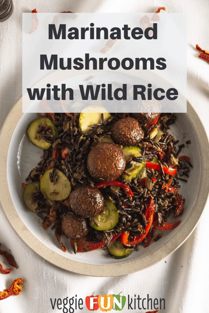 Marinated mushrooms and wild rice with veggies in a tan bowl with pinterest text overlay