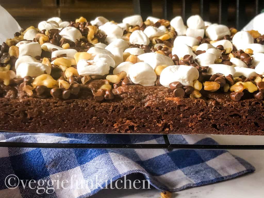 uncut and out of pan, rocky road brownies on cooling rack