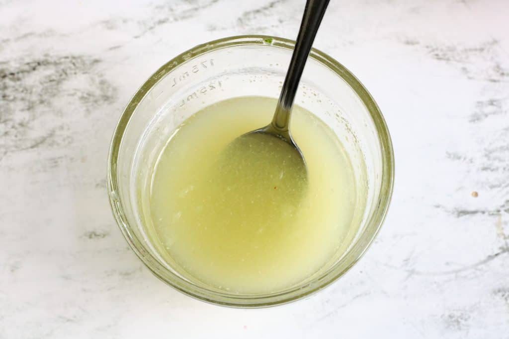 lime juice in glass bowl with spoon