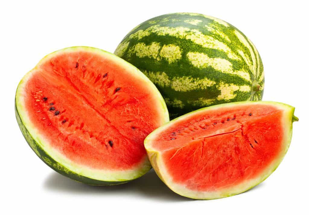 one whole watermelon an one cut watermelon 