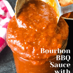 bourbon bbq sauce in glass jar with ladle and pinterest text overlay