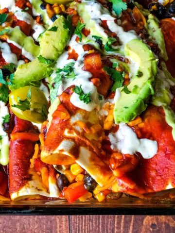 Black bean enchiladas in glass casserole dish