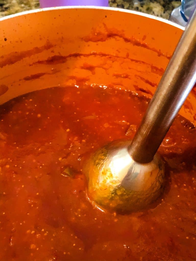 immersion blender blending bourbon fig bbq sauce