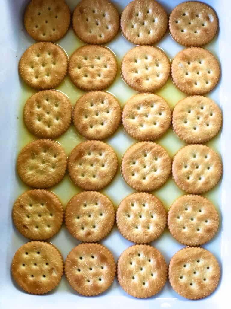 26 Ritz crackers in a butter-lined baking pan