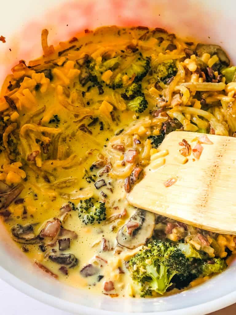 uncooked plant-based breakfast bake in casserole dish ready for the oven