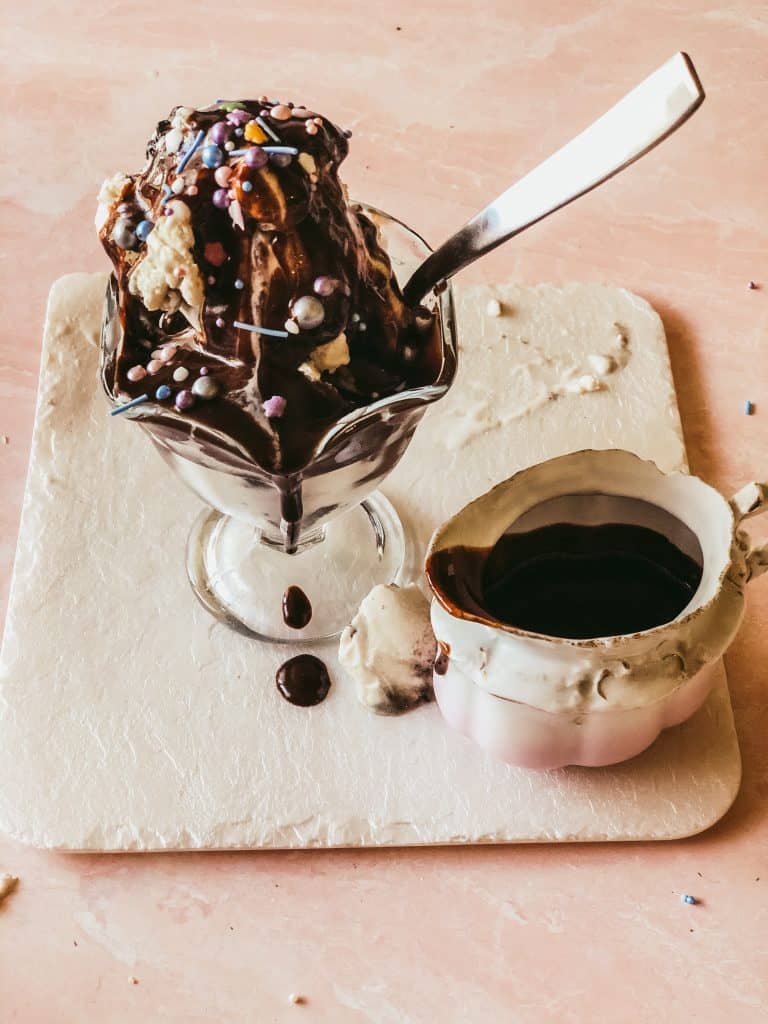vanilla ice cream with chocolate sauce on top
