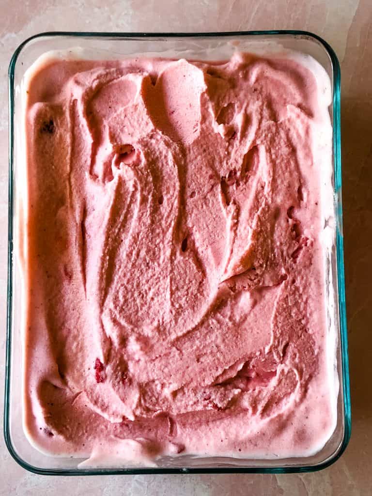 frozen strawberry ice cream in the container