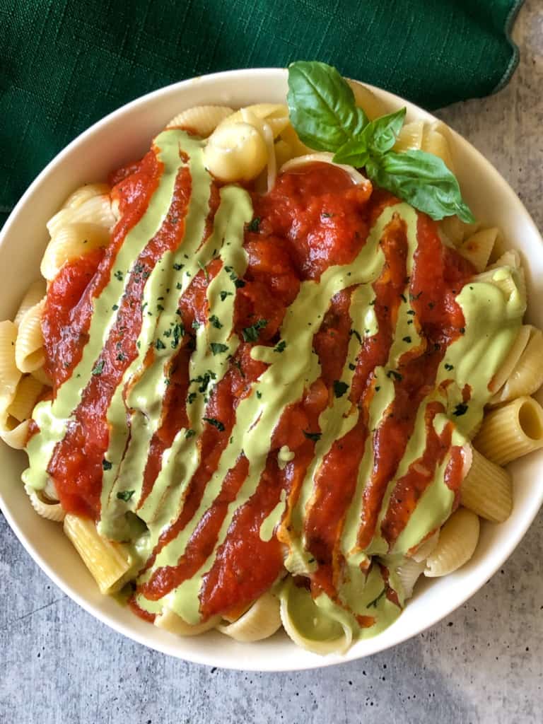 creamy basil dressing drizzled on pasta