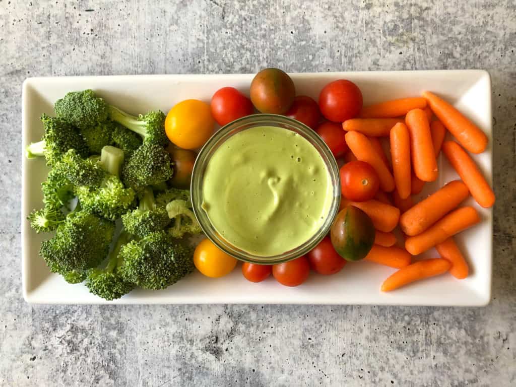 creamy basil dressing with a vegetable tray