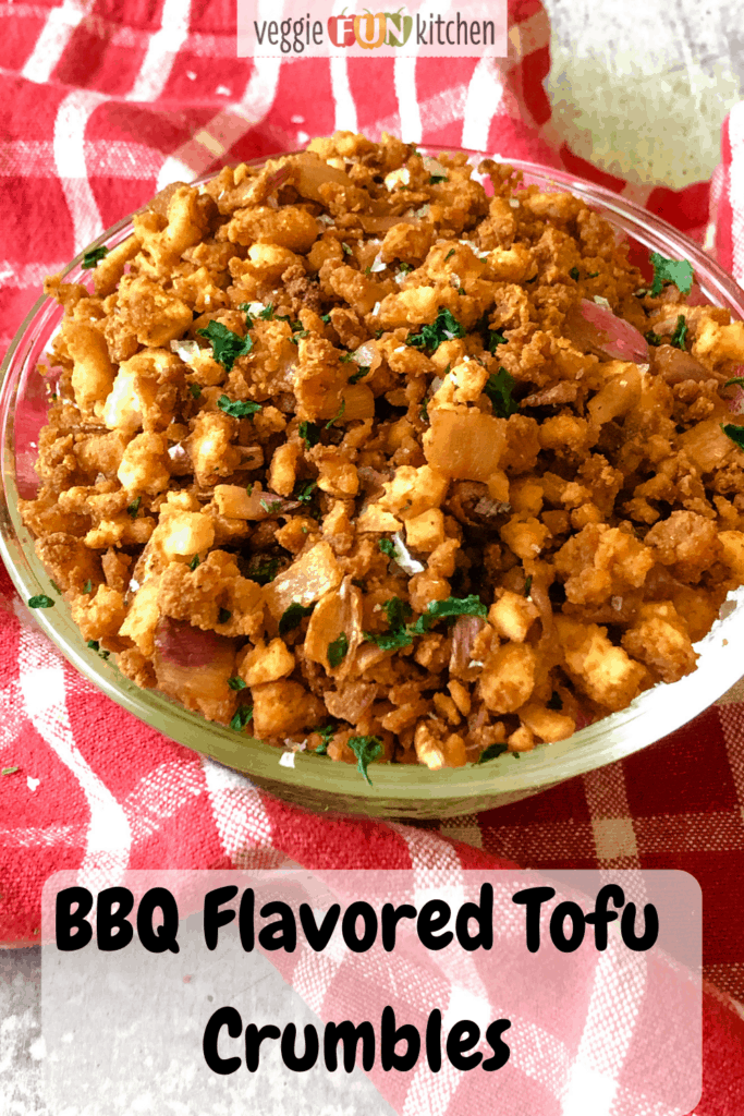 bbq tofu crumbles in a glass bowl with red checked napkin with pinterest text overlay