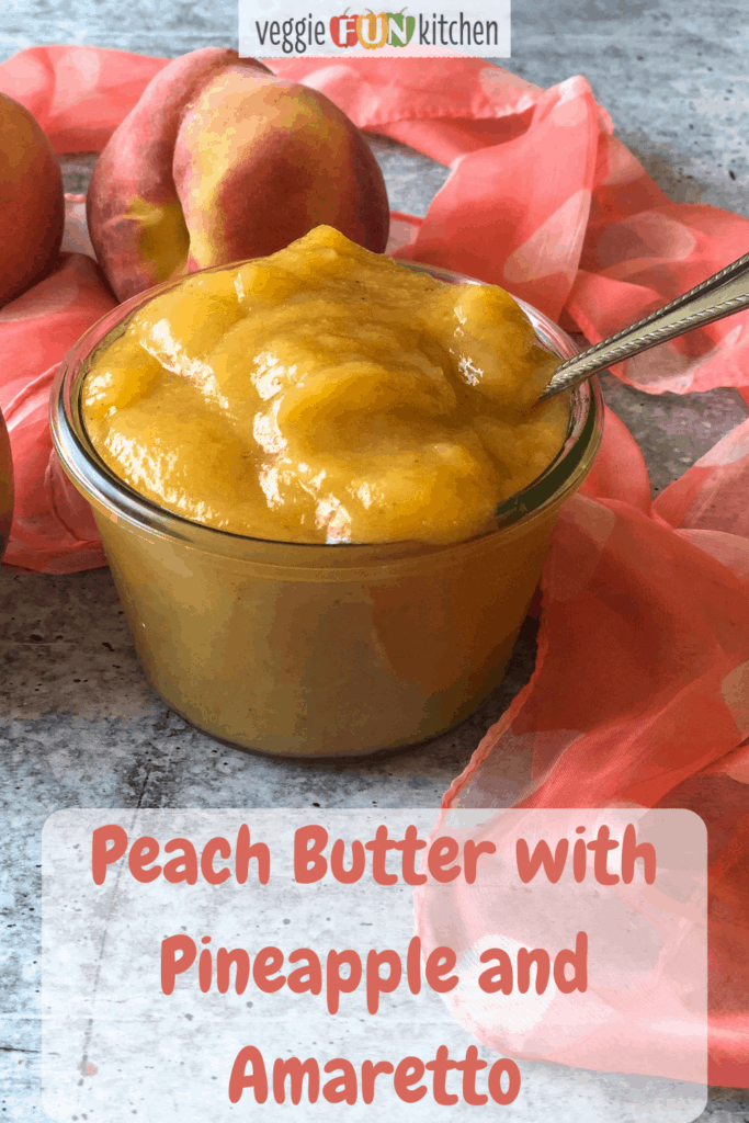 Peach butter in glass jar with peaches in background with pinterest text overlay