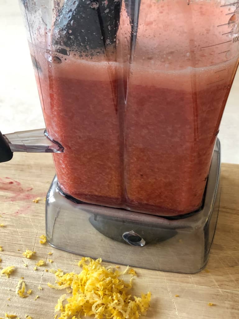 blending the strawberries and lemonade concentrate