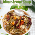 bowl of minestrone soup with large spoon and pinterest text overlay