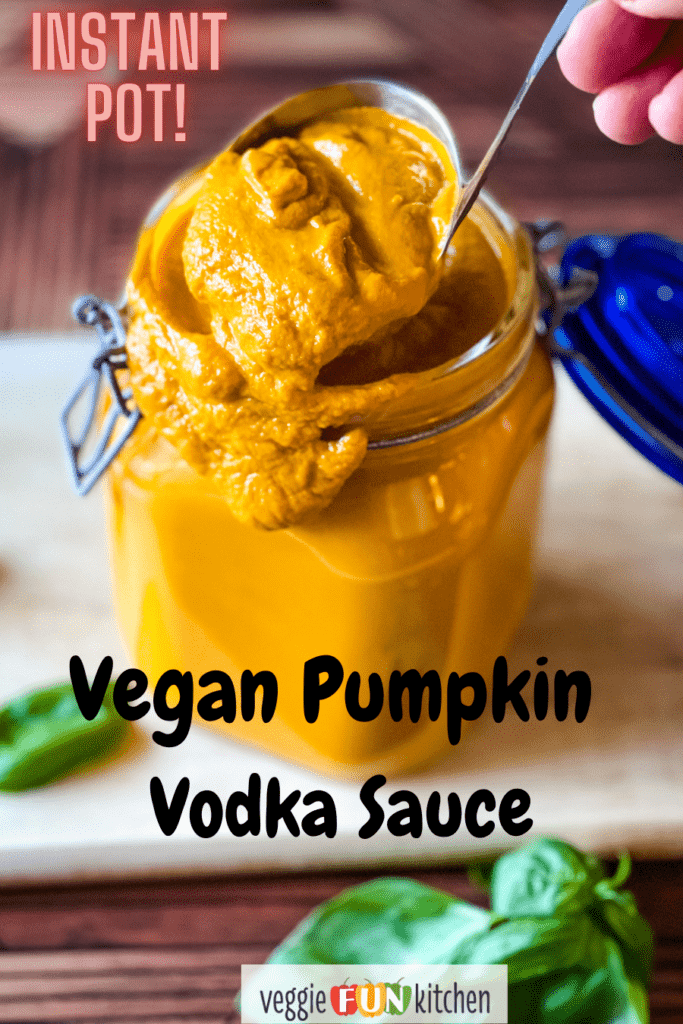 ladling out the finished pumpkin vodka sauce with pinterest text overlay