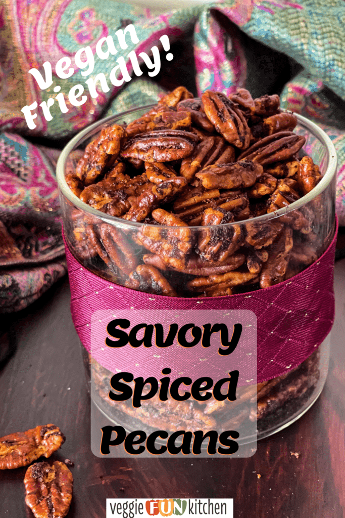 jar of savory pecans with fuchsia ribbon and scarf in background with pinterest text overlay