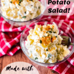 two glass bowls with potato salad on a red checked napkin with pinterest text overlay
