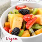 bowl of fresh fruit salad with pinterest text overlay