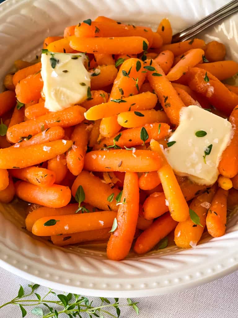 Bowl of buttered maple thyme carrots