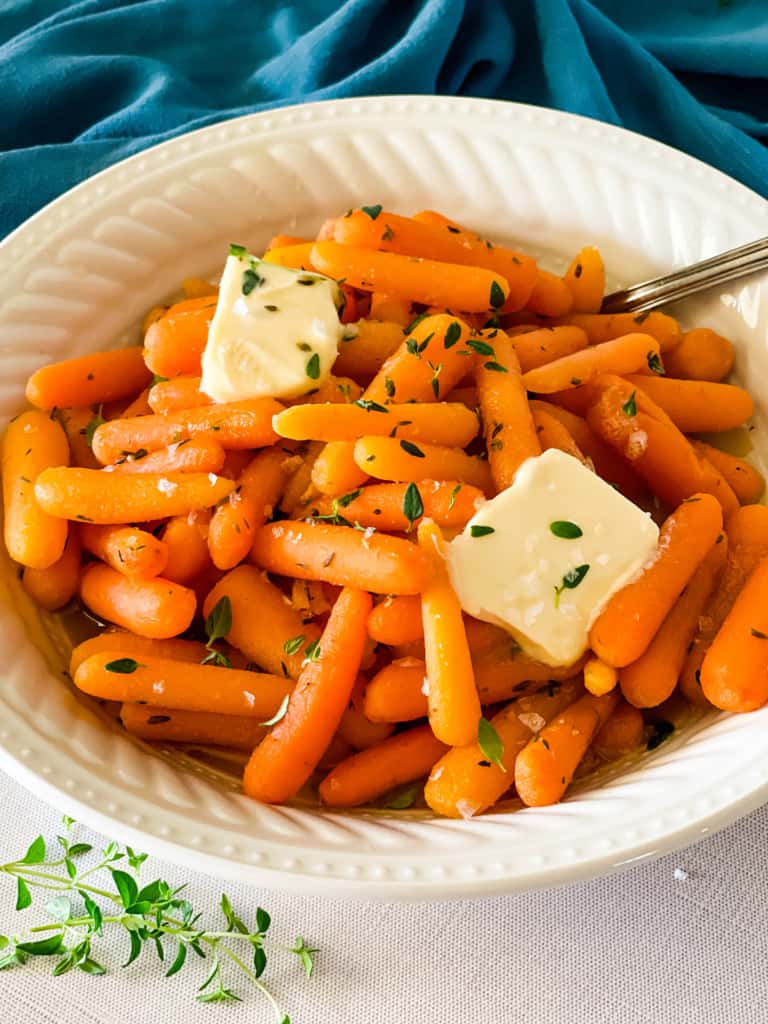 Bowl of buttered maple thyme carrots