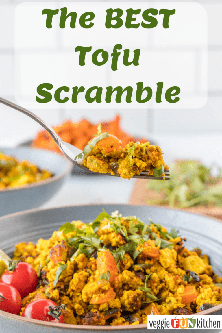 forkful of tofu scramble over bowl of tofu scramble with another bowl and sweet potatoes in background with pinterest text overlay