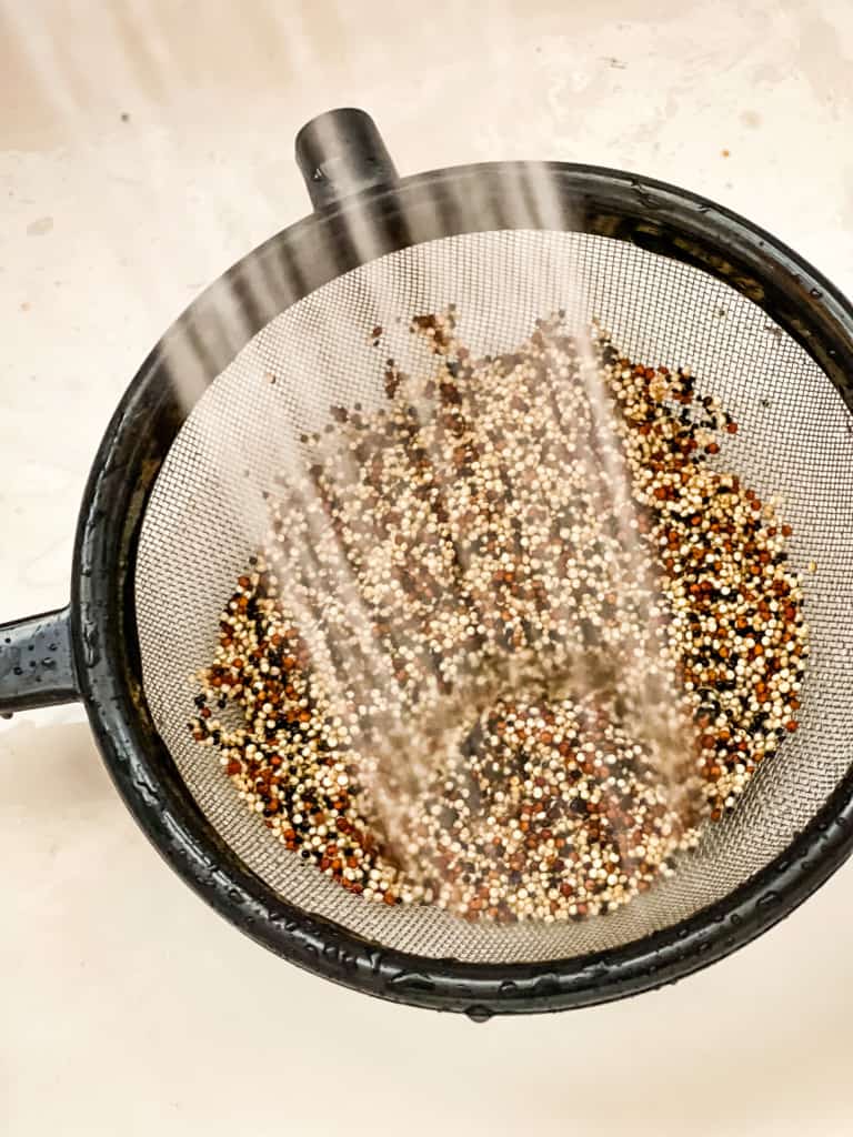 rinsing the quinoa