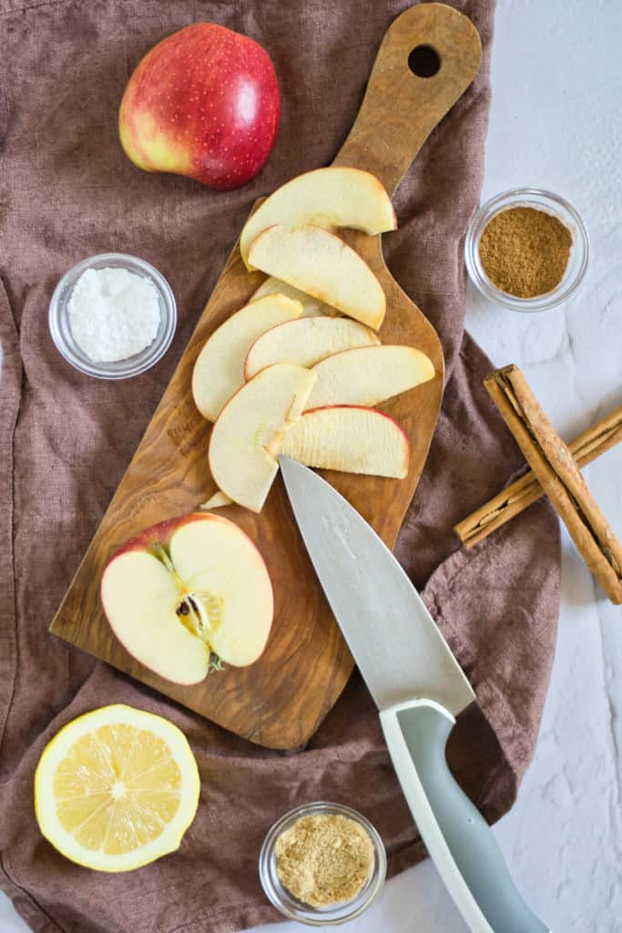 cutting apples on a cutting board