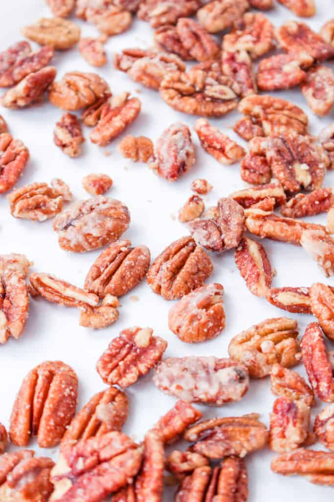 candied pecans cooling in single layer