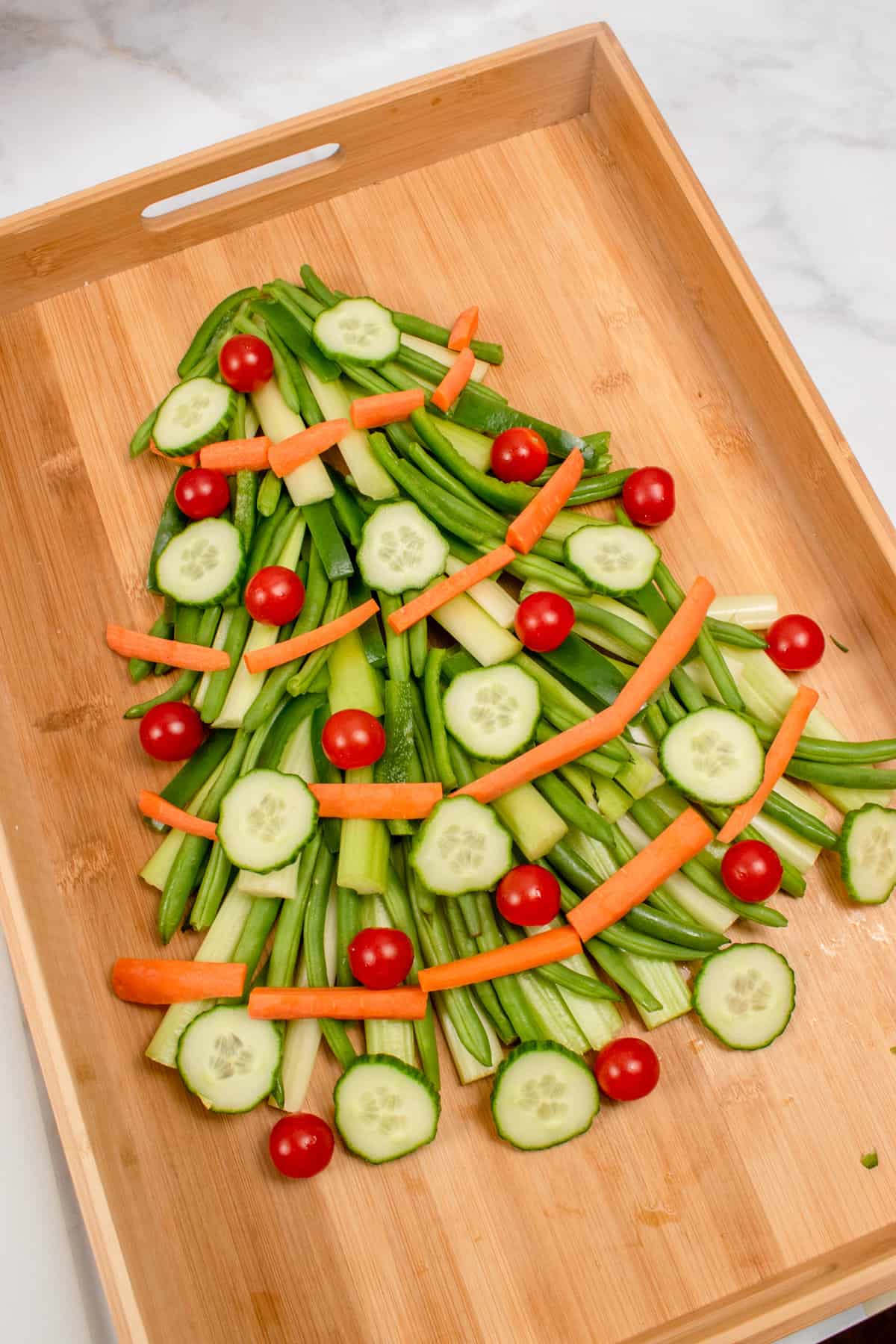 vegetable christmas tree appetizer on wooden board without the pasta star
