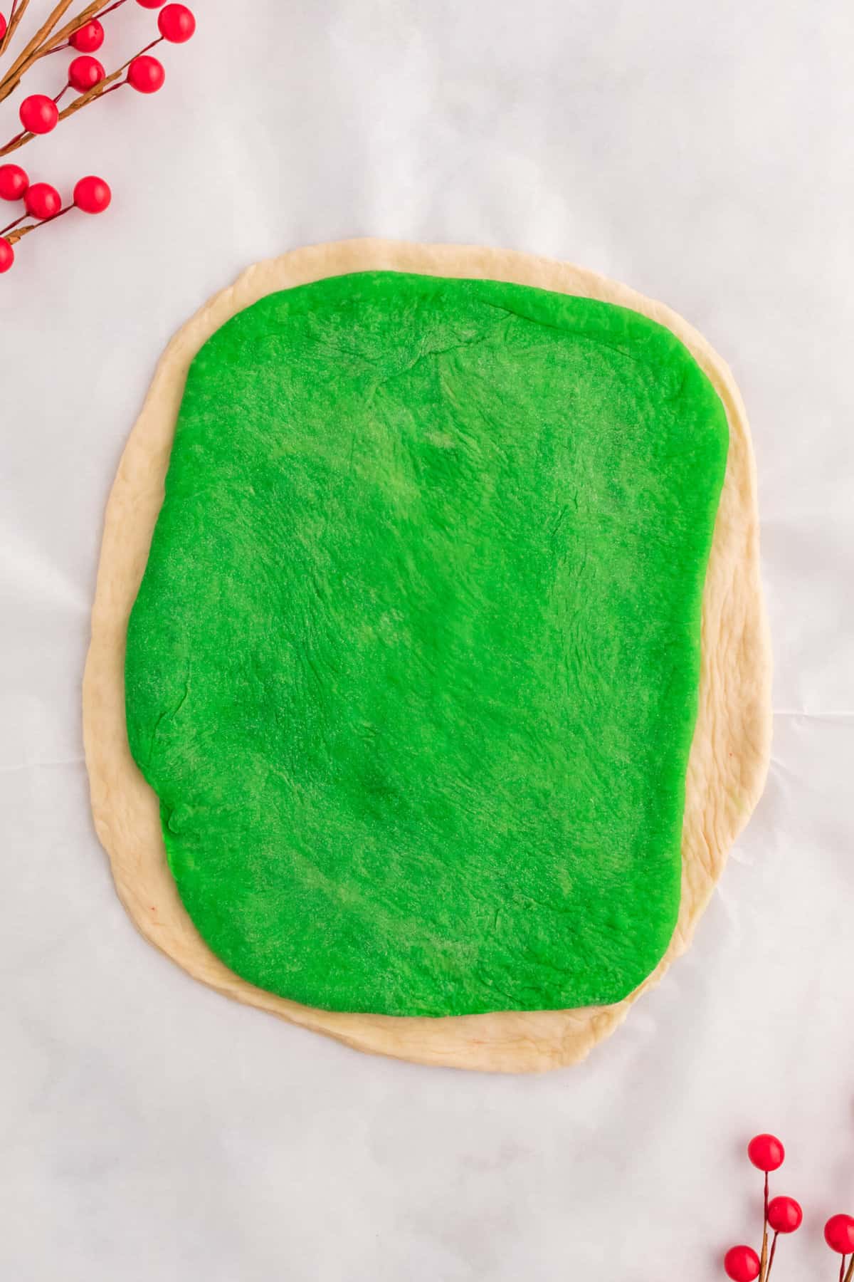 the white dough with the green on top