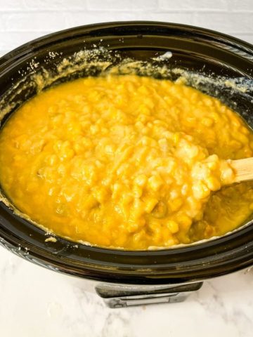 stirring together uncooked corn casserole