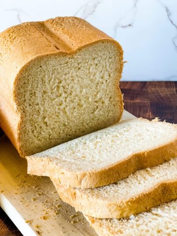 slices of bread machine white bread on cutting board