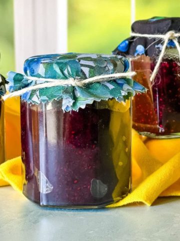 three jars of blueberry chia seed jam