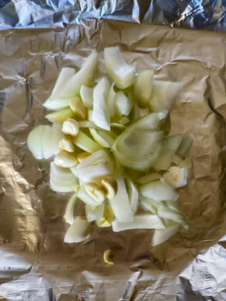 wrapping the chopped onions and garlic in foil