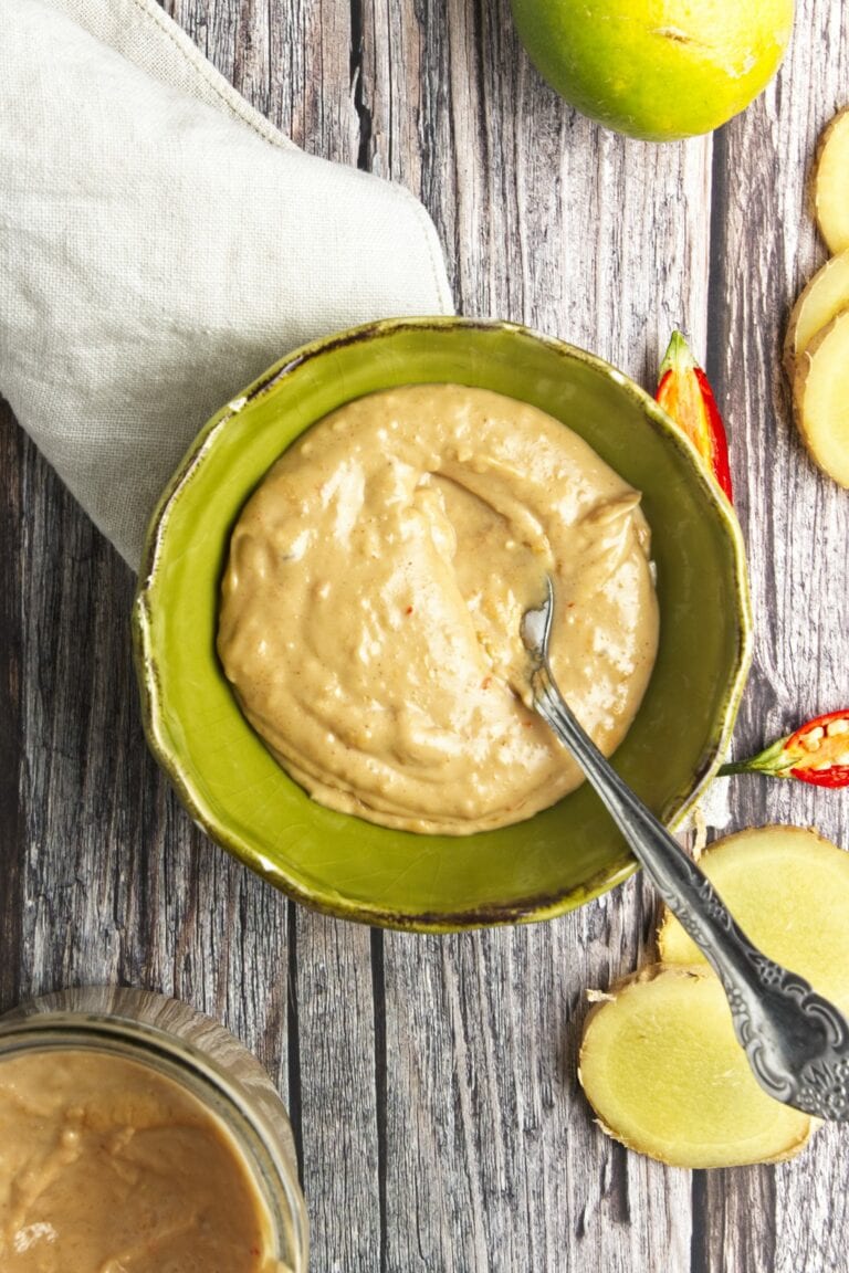 peanut sauce in green bowl with spoon