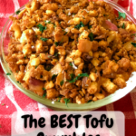 bowl of cooked tofu crumbles with pinterest text overlay