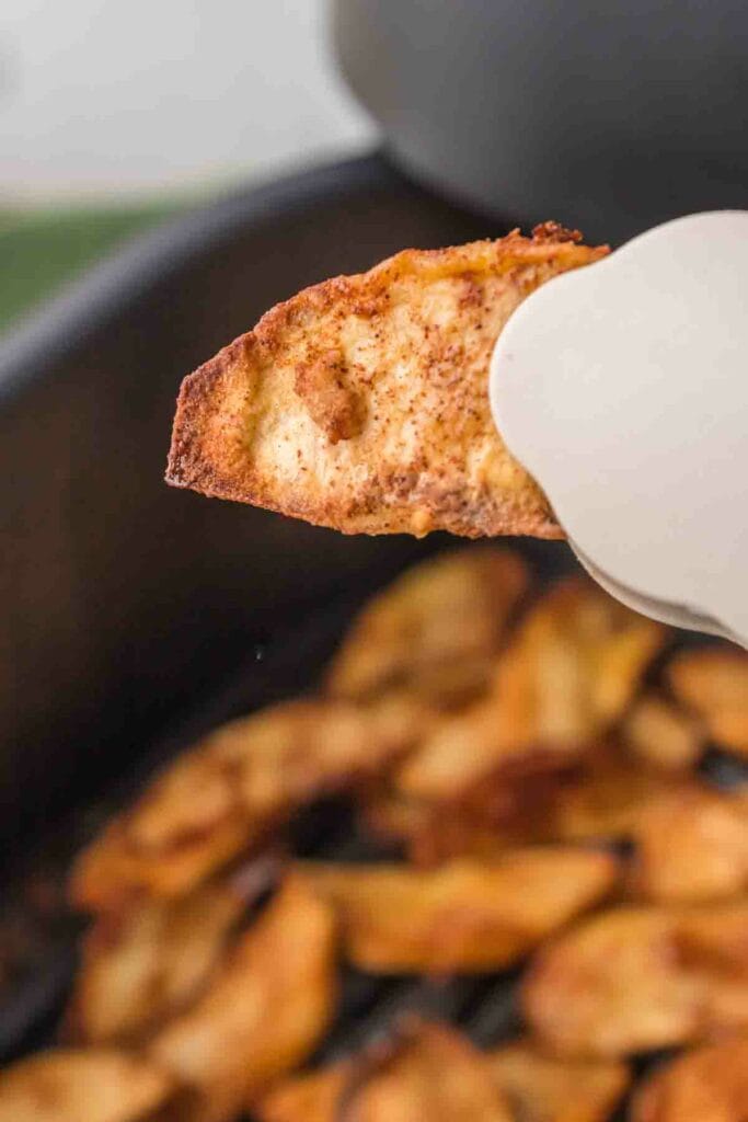 Showing an air fried apple slice.