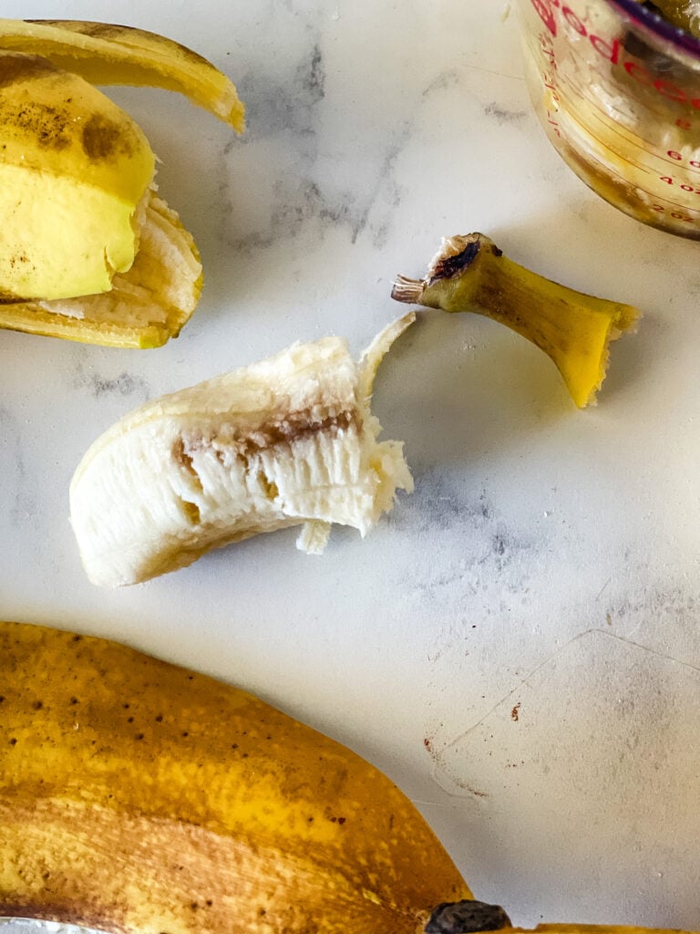 Showing a yucky spot on a banana.