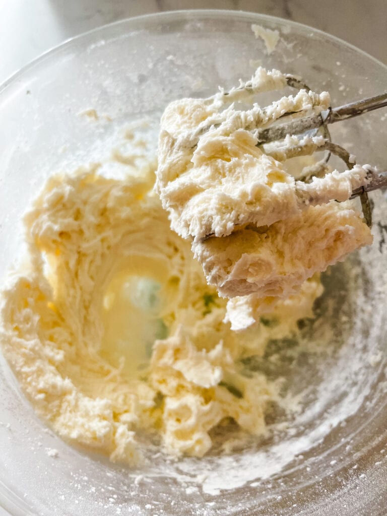 Powdered sugar is beat in.